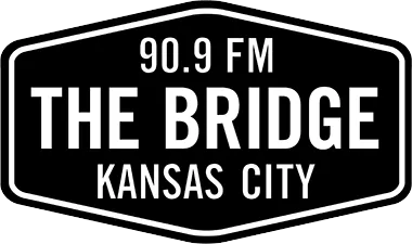 90.9 The Bridge logo in white text against a black background.